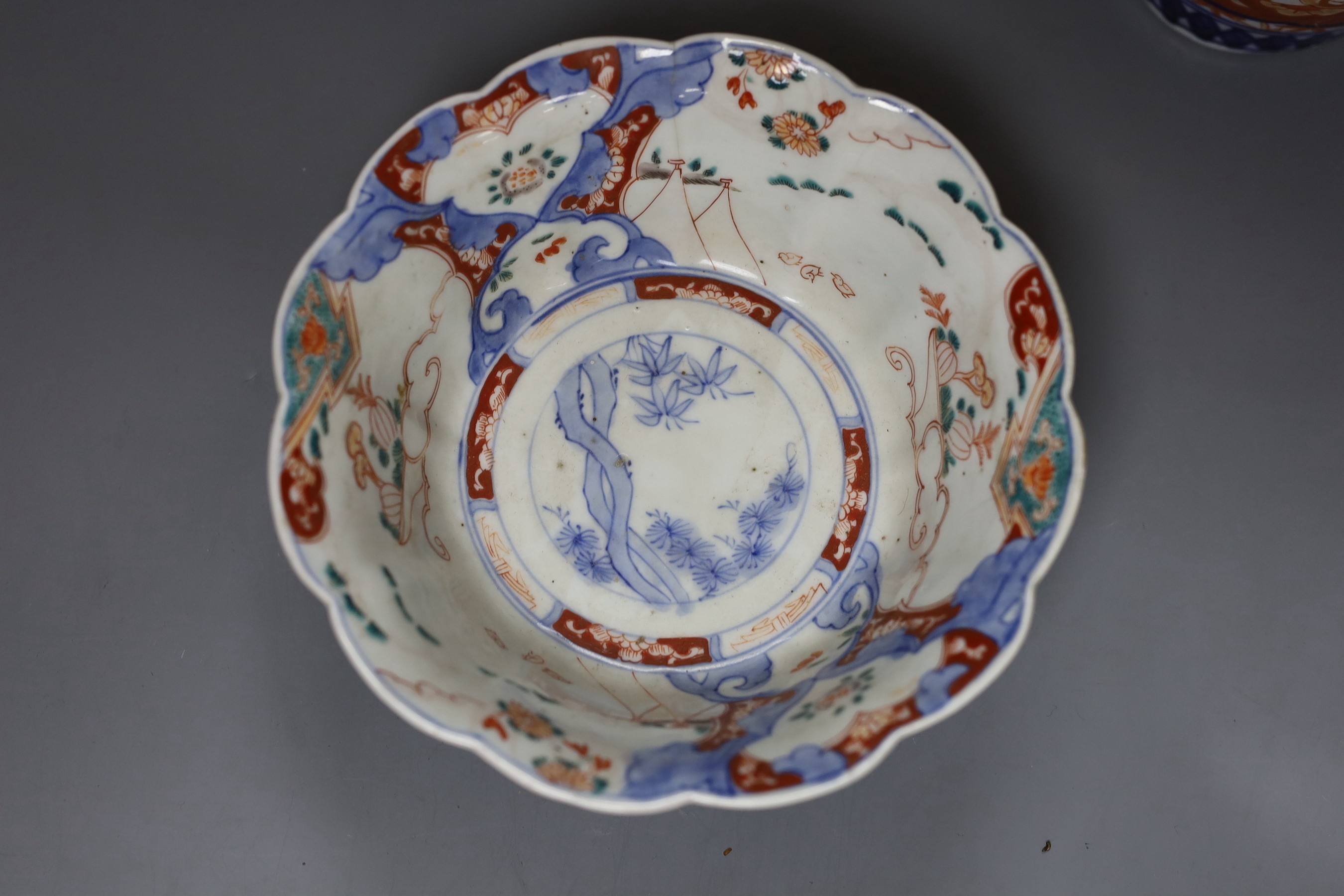 A 19th century Imari lobed dish and a pair of Imari vases, tallest 21cm